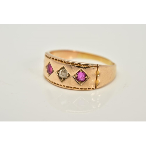 35 - A LATE VICTORIAN RUBY AND DIAMOND THREE STONE RING, an old mine cut diamond estimated weight 0.10ct,... 