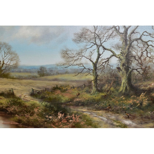 357 - WENDY REEVES (BRITISH? 1945) three oil on canvas paintings of British landscapes, trees devoid of le... 