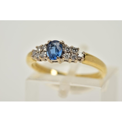 36 - A MODERN 18CT GOLD SAPPHIRE AND DIAMOND DRESS RING, estimated modern round brilliant cut diamond wei... 