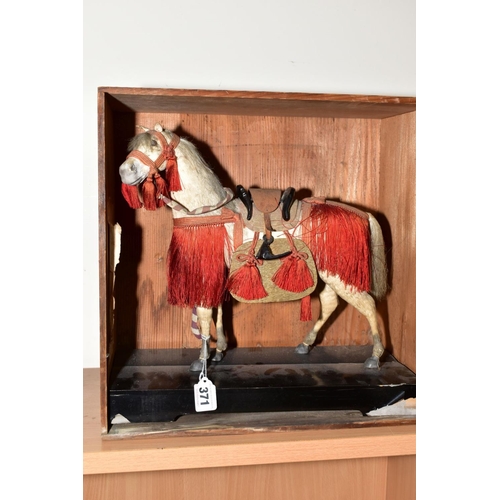 371 - A 20TH CENTURY ORIENTAL MODEL OF A HORSE, composition with pony skin effect, lacquer saddle and stir... 