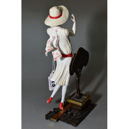 375 - AN ALBANY BONE CHINA AND BRONZE FIGURE, 'Chelsea', height 20cm