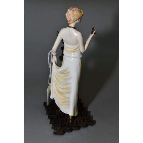 376 - AN ALBANY BONE CHINA AND BRONZE FIGURE, 'Monaco', height 19.5cm (missing petals from item in her han... 