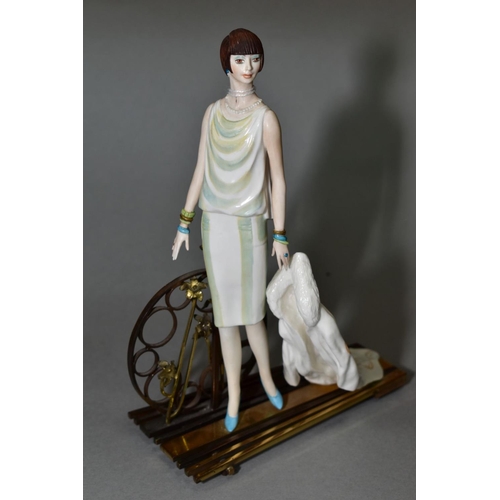 377 - AN ALBANY BONE CHINA AND BRONZE FIGURE, 'Ritz', height 20cm