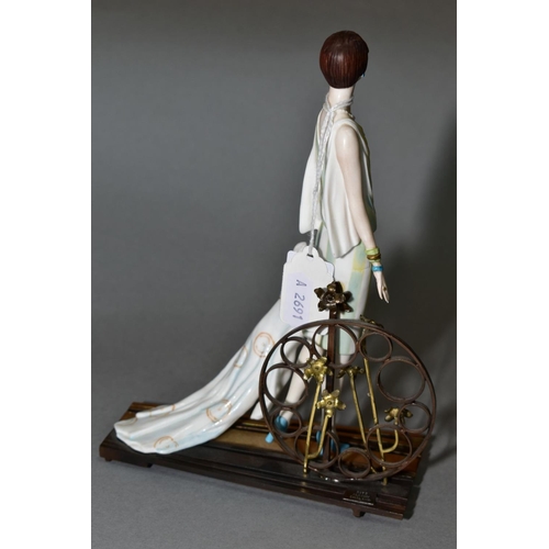 377 - AN ALBANY BONE CHINA AND BRONZE FIGURE, 'Ritz', height 20cm