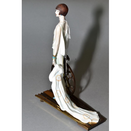 377 - AN ALBANY BONE CHINA AND BRONZE FIGURE, 'Ritz', height 20cm