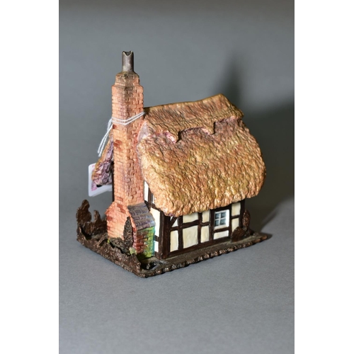 378 - AN ALBANY BONE CHINA AND BRONZE 'WORCESTERSHIRE COTTAGE', modelled by Caroline Parker, stamped to ba... 