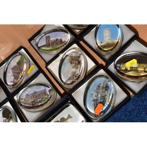 384 - A COLLECTION OF FORTY SEVEN BOXED OVAL GLASS PAPERWEIGHTS, each with a print to the base, mostly sce... 