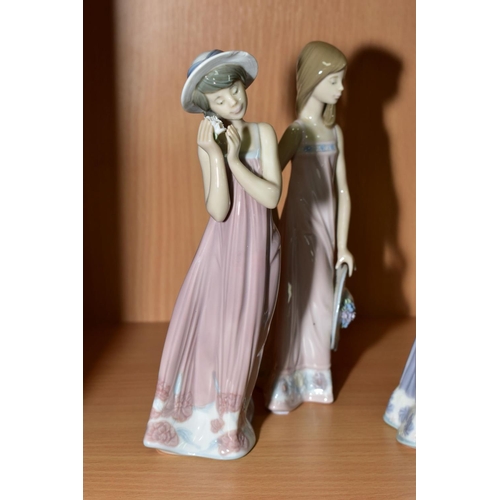 386 - A SET OF SIX LLADRO GIRLS WITH STRAW HATS FIGURES, designed and sculpted by Juan Huerta, comprising ... 