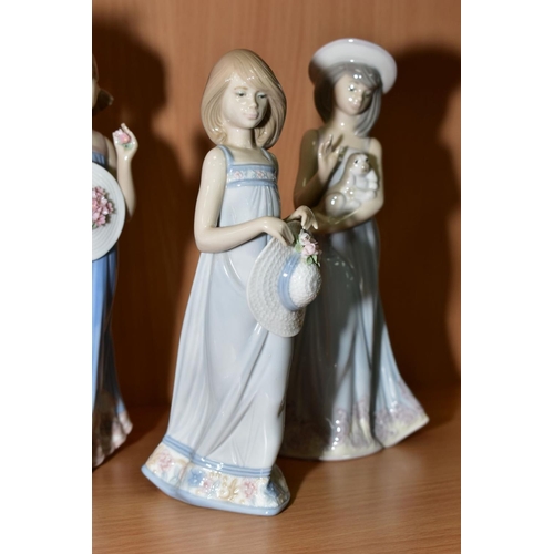 386 - A SET OF SIX LLADRO GIRLS WITH STRAW HATS FIGURES, designed and sculpted by Juan Huerta, comprising ... 