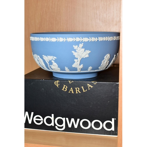 393 - A BOXED WEDGWOOD PALE BLUE JASPERWARE FRUIT BOWL, impressed marks diameter 20cm, together with a Vic... 