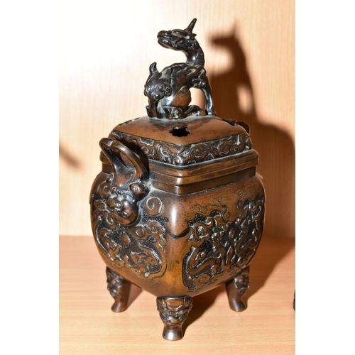 395 - AN EARLY 20TH CENTURY JAPANESE BRONZE KORO, dragon finial to the square cover, grotesque mask twin h... 