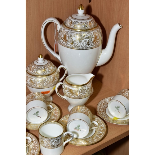 397 - A WEDGWOOD BONE CHINA COFFEE SET, pattern No. W4219 (Gold Florentine), mixed backstamps/ages, compri... 