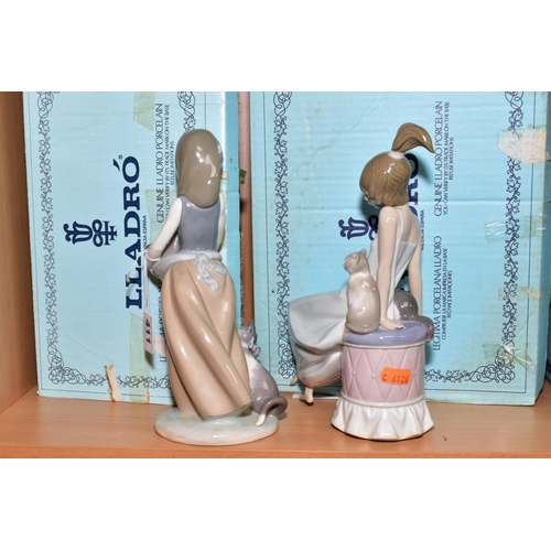 411 - TWO BOXED LLADRO FIGURES, 'Following Her Cats' No. 1309, designed by Juan Huerta, height 24.5cm and ... 