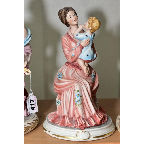 417 - THREE CAPO DI MONTE PORCELAIN FIGURES, two depicting mothers holding infants, both signed 'Cortese' ... 