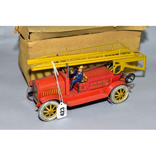 423 - A DISTLER TINPLATE CLOCKWORK FIRE ENGINE, missing extension ladder and winding mechanism and headlam... 