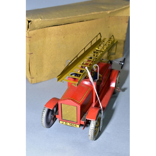 423 - A DISTLER TINPLATE CLOCKWORK FIRE ENGINE, missing extension ladder and winding mechanism and headlam... 