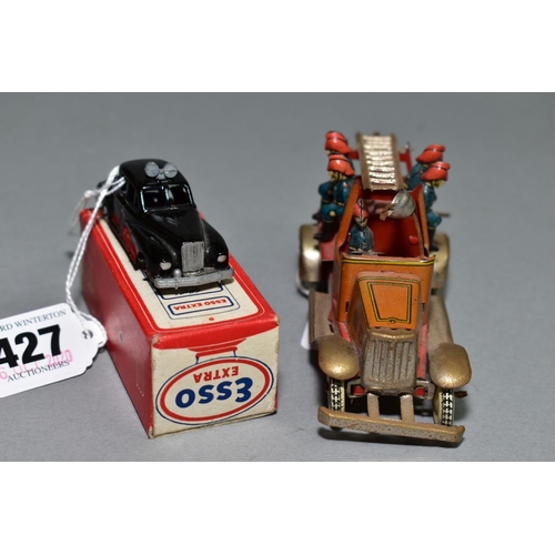 427 - A TINPLATE CLOCKWORK FIRE ENGINE, faded brown bonnet and cab, red chassis and body, movable ladder, ... 