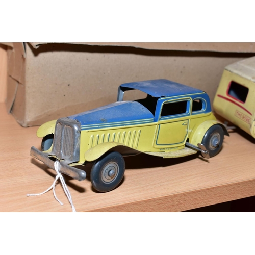 432 - A METTOY TINPLATE CLOCKWORK TWO DOOR SALOON CAR AND METTOY TINPLATE CARAVAN, car has cream body and ... 