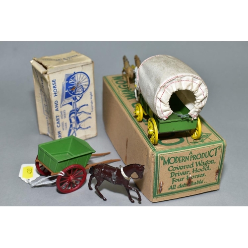 433 - A BOXED MODERN PRODUCTS COVERED WAGON WITH FOUR HORSES, green body, yellow wheels, plain canopy with... 