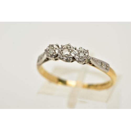 45 - AN EARLY 20TH CENTURY THREE STONE DIAMOND RING, set with a row of three illusion set single cut diam... 