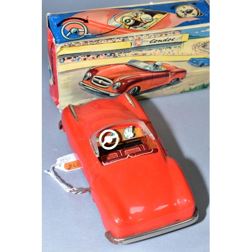 450 - A BOXED JNF CONDOR TINPLATE CLOCKWORK RACING CAR, red with brown interior, lightly playworn conditio... 