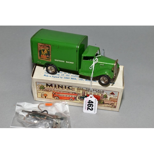 462 - A BOXED TRI-ANG MINIC SOUTHERN RAILWAY DELIVERY VAN, No. 82M, green livery with Tri-ang poster to bo... 