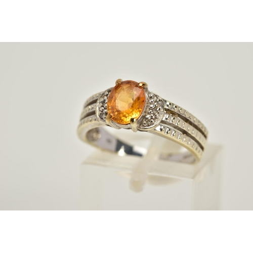 49 - A 9CT WHITE GOLD YELLOW SAPPHIRE RING, designed with a claw set, oval cut yellow sapphire, flanked w... 