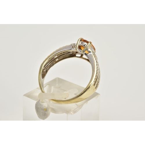 49 - A 9CT WHITE GOLD YELLOW SAPPHIRE RING, designed with a claw set, oval cut yellow sapphire, flanked w... 