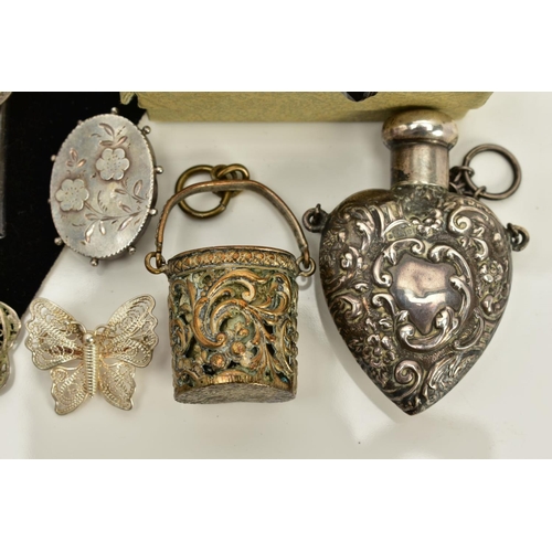 5 - A MISCELLANEOUS SELECTION OF ITEMS, to include a silver heart shaped snuff bottle, embossed with flo... 