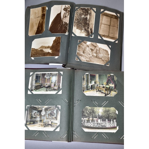 525 - TWO VINTAGE POSTCARD ALBUMS, one containing approximately  145 sepia photographic postcards of mostl... 