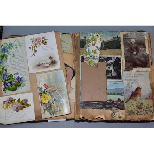 529 - AN EARLY 20TH CENTURY SCRAPBOOK, containing postcards, greetings cards and newspaper cuttings