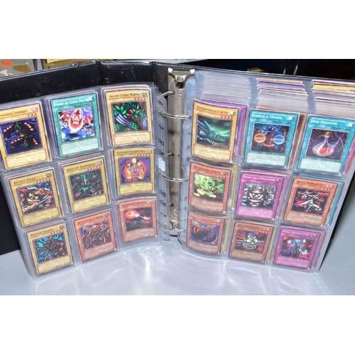 553 - A COLLECTION OF ASSORTED KONAMI YU-GI-OH TRADING CARDS, over one thousand cards from various series ... 