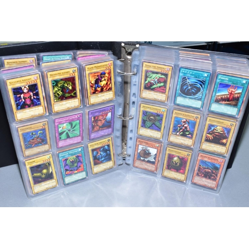 553 - A COLLECTION OF ASSORTED KONAMI YU-GI-OH TRADING CARDS, over one thousand cards from various series ... 