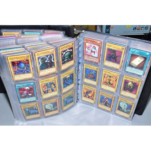 553 - A COLLECTION OF ASSORTED KONAMI YU-GI-OH TRADING CARDS, over one thousand cards from various series ... 