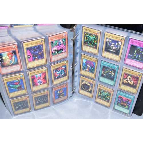 553 - A COLLECTION OF ASSORTED KONAMI YU-GI-OH TRADING CARDS, over one thousand cards from various series ... 