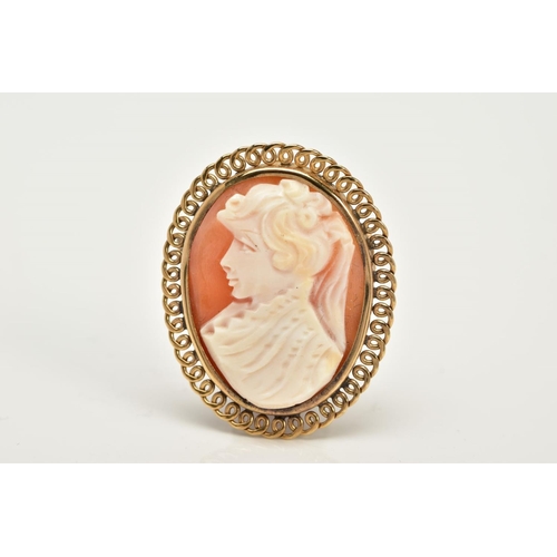 53 - A 9CT GOLD CAMEO BROOCH, of oval design, depicting a lady in profile, open work scallop surround, ha... 