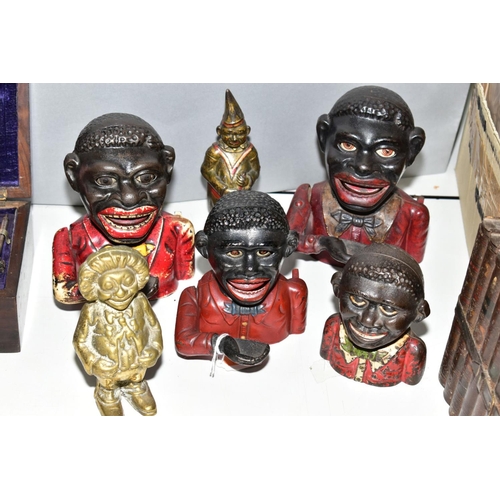 530 - FIVE CAST IRON MONEY BANKS AND A BRASS EXAMPLE, including a 'Little Joe Bank', a clown bank, various... 