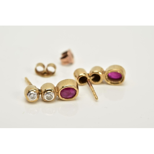 54 - A PAIR OF 9CT GOLD DIAMOND AND RUBY DROP EARRINGS, each designed with two round brilliant cut diamon... 