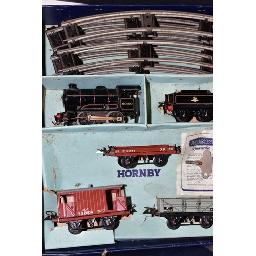 566 - A BOXED HORNBY 0 GAUGE CLOCKWORK GOODS SET, No50, locomotive and tender, No60199, B R lined black li... 