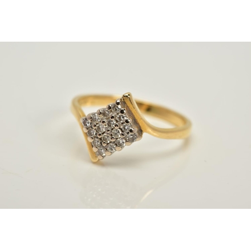 57 - AN 18CT GOLD DIAMOND RING, designed with a lozenge of single cut diamonds, crossover over shoulders,... 