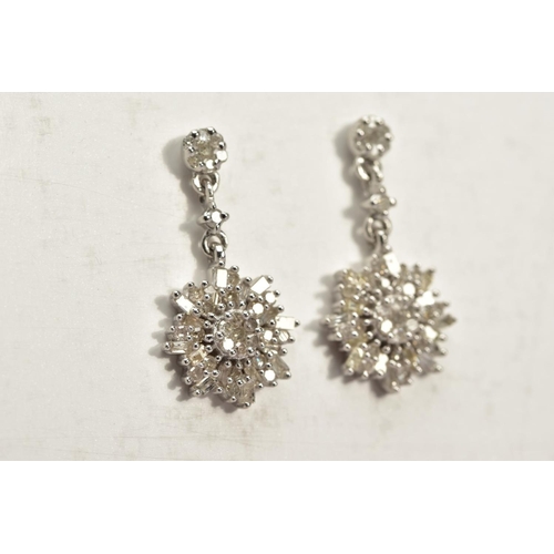 58 - A PAIR OF DIAMOND DROP EARRINGS, each white metal earring designed with a single cut diamond stud su... 