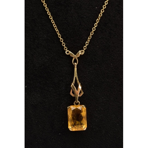 59 - A 9CT GOLD CTIRINE PENDANT NECKLACE, designed with an open work pendant suspending a claw set, recta... 