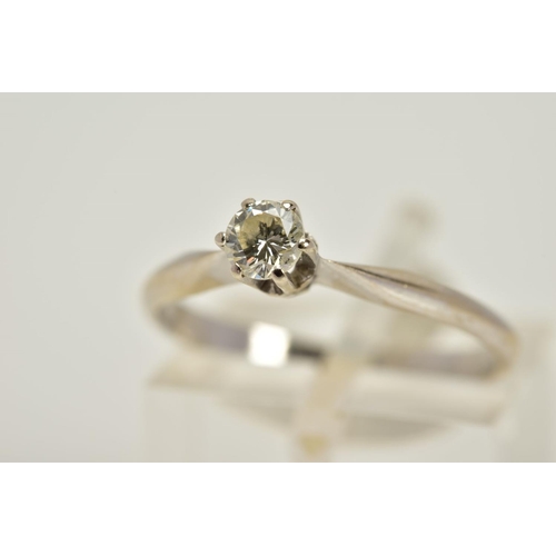 62 - A SINGLE STONE DIAMOND RING, the white metal ring designed with a claw set, round brilliant cut diam... 