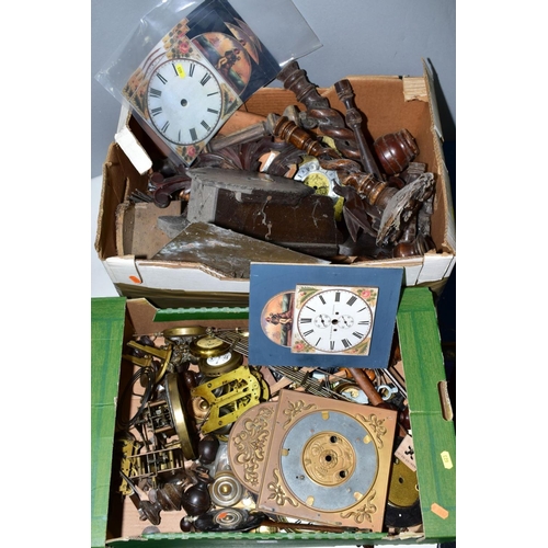 623 - THREE BOXES OF CLOCK PARTS, including movements, dials, pendulums, case finials and uprights, hands ... 