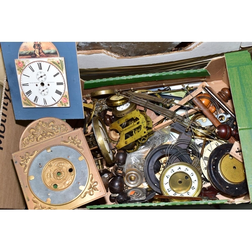 623 - THREE BOXES OF CLOCK PARTS, including movements, dials, pendulums, case finials and uprights, hands ... 