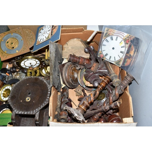 623 - THREE BOXES OF CLOCK PARTS, including movements, dials, pendulums, case finials and uprights, hands ... 