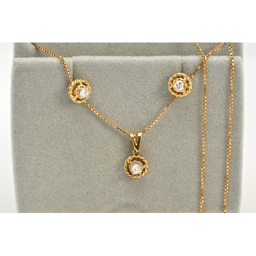 64 - AN 18CT GOLD DIAMOND PENDANT NECKLACE AND EARRING SET, the pendant set with a single round brilliant... 