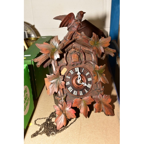 651 - FOUR CARVED WOODEN CUCKOO CLOCKS