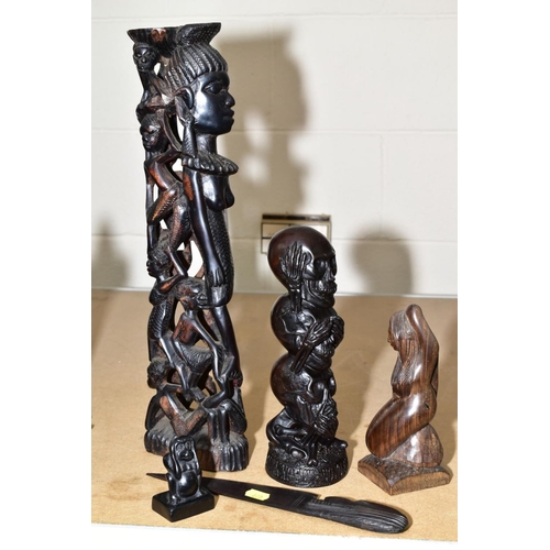 660 - NATIVE ART INTEREST, carved hardwood figure of a woman surrounded by men and women 46cm high, carved... 