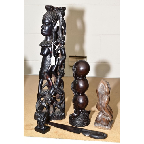 660 - NATIVE ART INTEREST, carved hardwood figure of a woman surrounded by men and women 46cm high, carved... 